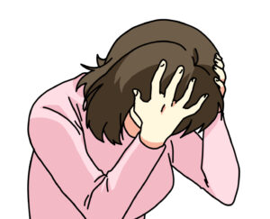 頭を抱える女性
